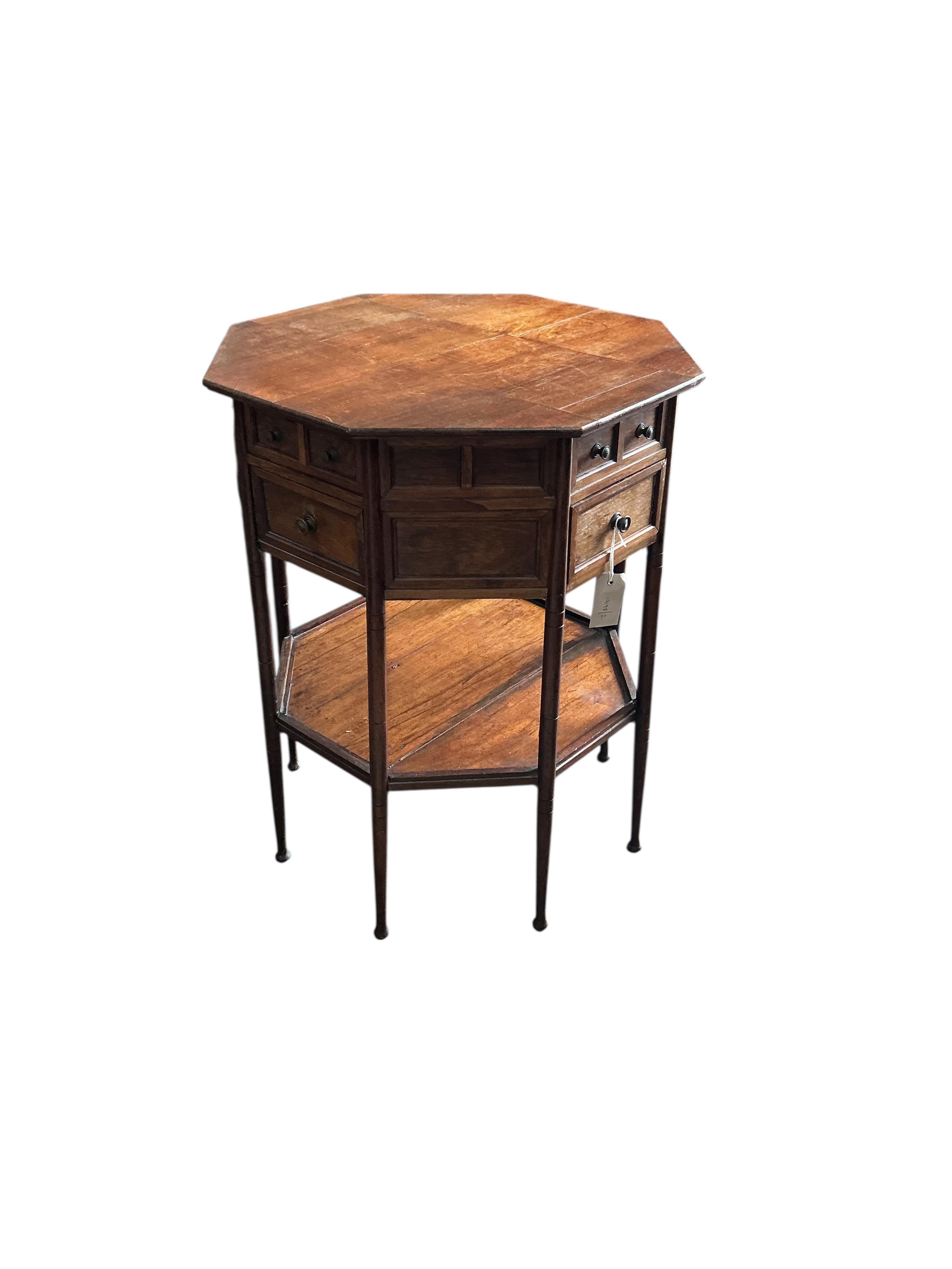 A late Victorian octagonal rosewood two tier work table, width 54cm, height 68cm